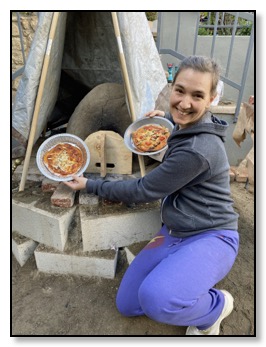 mitra at oven with pizza first two Jan 2021
