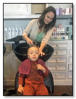 Tiger getting shampoo and hair cut