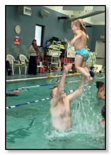 Tiger in flight at swimming